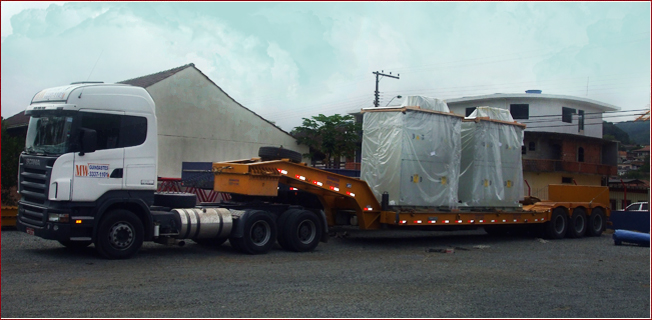 Transporte com carreta prancha 3 eixos.